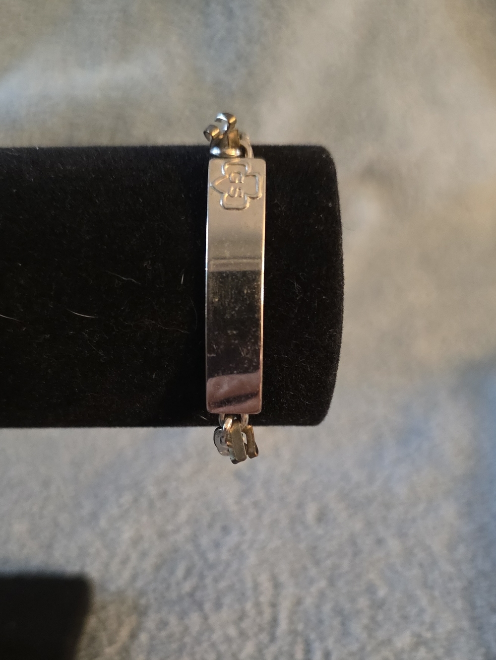 vintage Girl Scouts identification bracelet featuring the classic trefoil logo